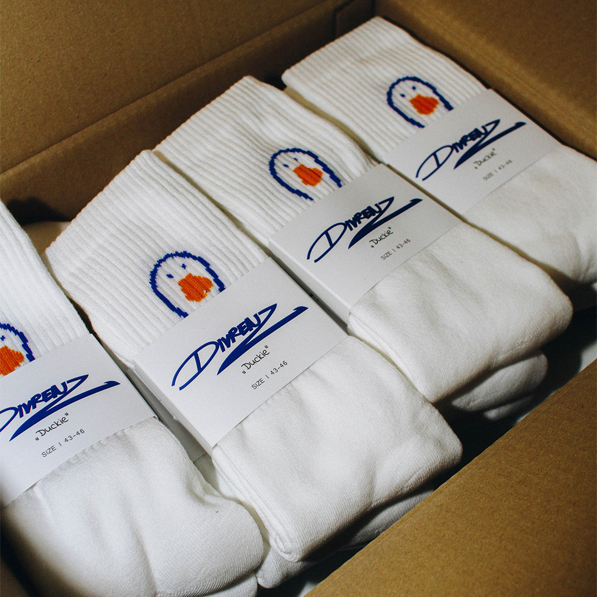 B2B-Biobaumwoll-Socken mit gewebtem Logo – nachhaltige Socken personalisieren lassen bei Gib Rillé
